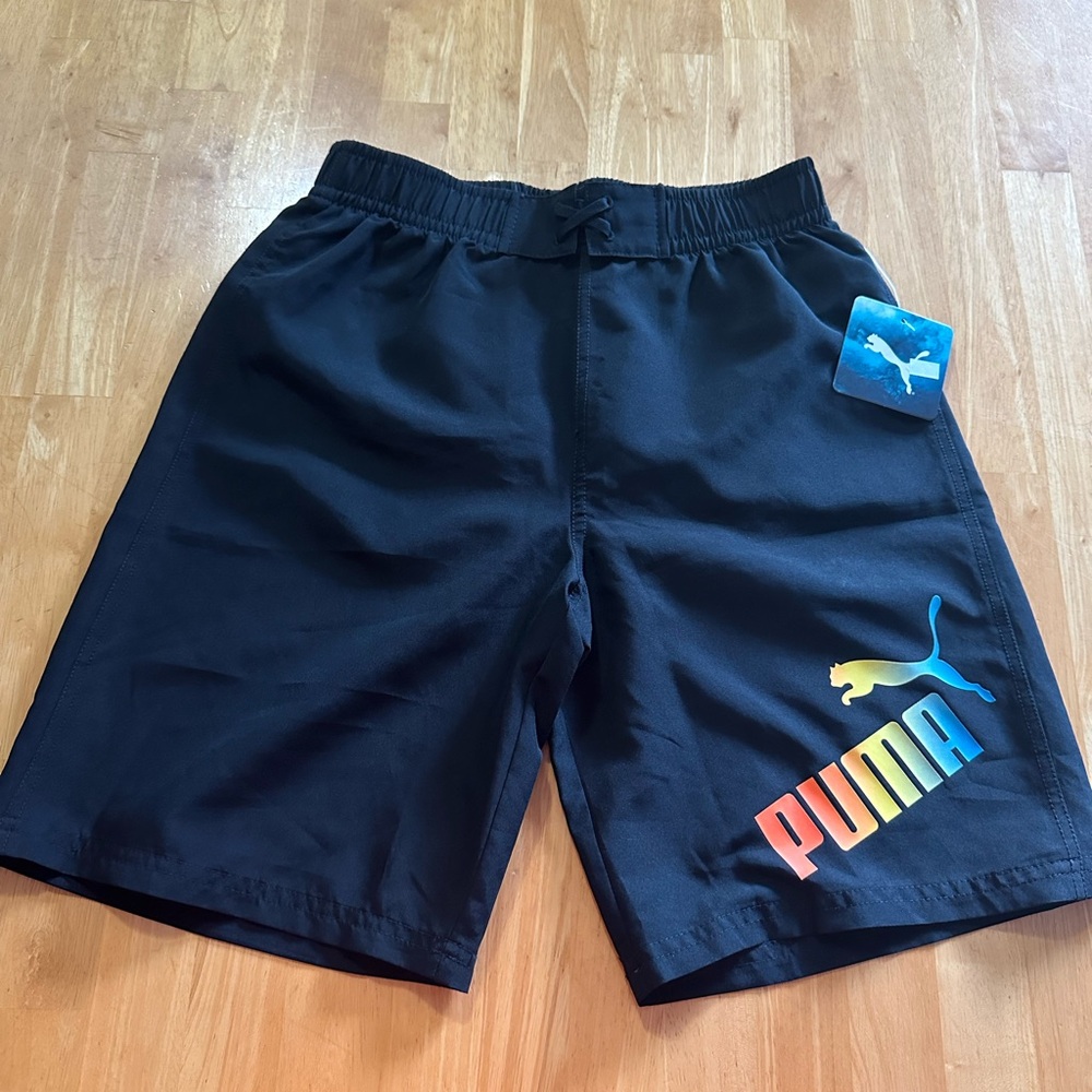 Puma shorts/swim shorts. NWT . Size L. ❣️